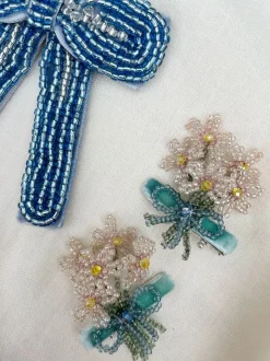 Celebration peal bow hair clip