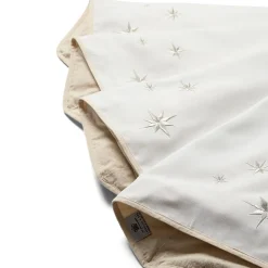 Christmas tree skirt with embroidered silver stars