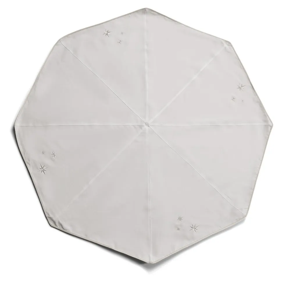 Christmas tree skirt with embroidered silver stars