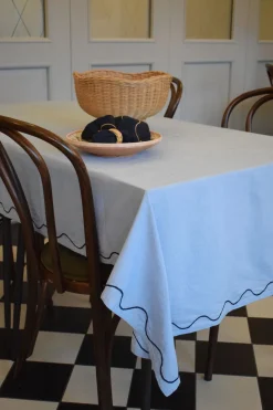 Curved embroidery table cloth