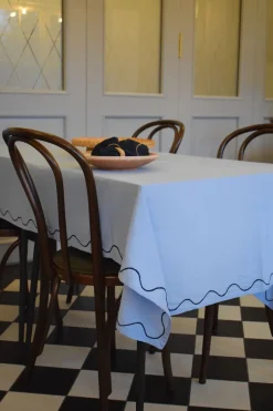 Curved embroidery table cloth